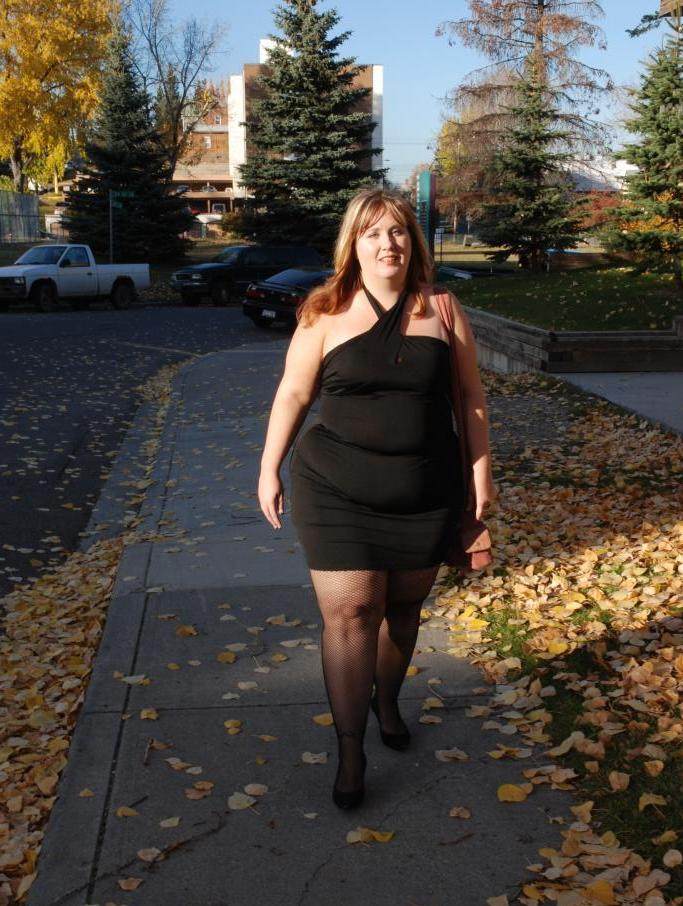 Bree BBW blonde in tight black dress and black stockings suburbs